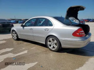 2005 Mercedes-Benz E 5.0L with VIN WDBUF70J95A718132, listed as a Copart auction lot 51620185 with 249,876 mi miles and Salvage Title. Bid and sale history available at carsss.com. Image 2.