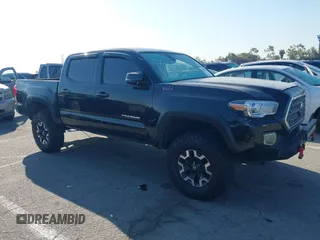 2019 Toyota Tacoma SR z VIN 5TFCZ5AN9KX199814, wystawiony jako IAAI lot #41841821 z przebiegiem 69 276 mil mil oraz . Historia ofert i sprzedaży dostępna na DreamBid. Obrazek 13.