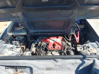 1986 Pontiac Fiero z VIN 1G2PF3790GP231392, wystawiony jako IAAI lot #41870267 z przebiegiem 156 718 mil mil oraz . Historia ofert i sprzedaży dostępna na DreamBid. Obrazek 10.