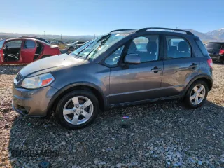 2012 Suzuki SX4 Crossover with VIN JS2YB5A31C6306926, listed as a Copart auction lot 79307604 with 131,762 mi miles and Salvage Title. Bid and sale history available at carsss.com. Image 1.