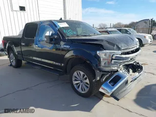 2018 Ford F-150 XL with VIN 1FTFW1E19JFE70770, listed as a IAAI auction lot 41571709 with 57,099 mi miles. Bid and sale history available at carsss.com. Image 1.
