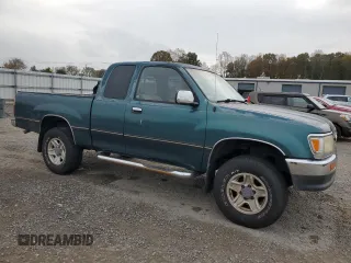 1997 Toyota T100 SR5 with VIN JT4UN24DXV0048933, listed as a Copart auction lot 79479214 with 311,763 mi miles and Clean Title. Bid and sale history available at DreamBid. Image 4.