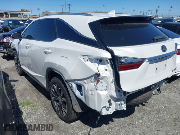 2018 Lexus RX with VIN JTJGZKCA0J2004007, listed as a IAAI auction lot 41382473 with 104,630 mi miles. Bid and sale history available at carsss.com. Image 3.