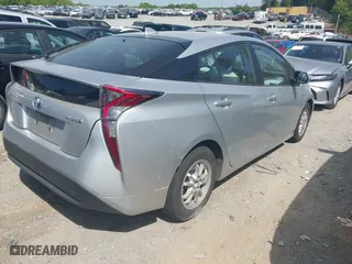2016 Toyota Prius Four with VIN JTDKARFU8G3024205, listed as a IAAI auction lot 42052173 with 66,737 mi miles. Bid and sale history available at carsss.com. Image 4.