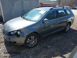 2014 Volkswagen Jetta SportWagen TDI with VIN 3VWML7AJ8EM601098, listed as a IAAI auction lot 41776232 with 139,969 mi miles. Bid and sale history available at carsss.com. Image 2.