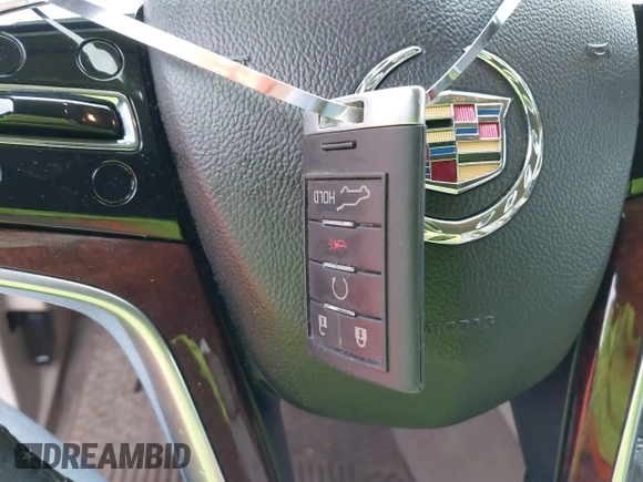 2013 Cadillac SRX Premium Collection with VIN 3GYFNEE3XDS604238, listed as a IAAI auction lot 41949780 with 71,563 mi miles and . Bid and sale history available at DreamBid. Image 11.