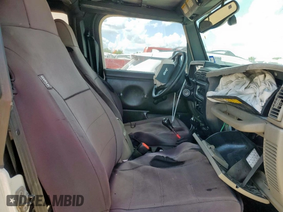 2004 Jeep Wrangler Sport z VIN 1J4FA49SX4P802341, wystawiony jako Copart lot #62752565 z przebiegiem 150 197 mil mil oraz Szkoda całkowita • Salvage title. Historia ofert i sprzedaży dostępna na DreamBid. Obrazek 10.