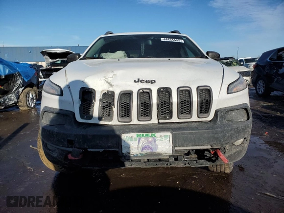2015 Jeep Cherokee Trailhawk with VIN 1C4PJMBB5FW778883, listed as a Copart auction lot 44444555 with 113,194 mi miles and Salvage title. Bid and sale history available at DreamBid. Image 5.
