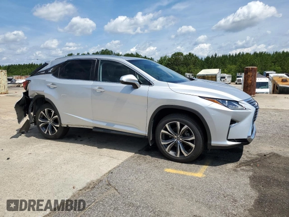 2018 Lexus RX 350 with VIN JTJBZMCA1J2034266, listed as a Copart auction lot 59900105 with 44,171 mi miles and Salvage title. Bid and sale history available at DreamBid. Image 4.