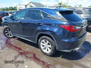 2017 Lexus RX 350 z VIN 2T2BZMCA8HC054041, wystawiony jako IAAI lot #42277425 z przebiegiem 101 655 mil mil oraz . Historia ofert i sprzedaży dostępna na DreamBid. Obrazek 3.