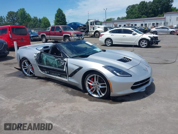 2014 Chevrolet Corvette Z51 3LT z VIN 1G1YM3D7XE5120603, wystawiony jako IAAI lot #42313984 z przebiegiem 64 199 mil mil oraz . Historia ofert i sprzedaży dostępna na DreamBid. Obrazek 1.