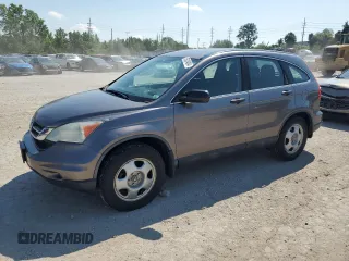 2011 Honda CR-V LX z VIN 5J6RE3H33BL035183, wystawiony jako Copart lot #59334804 z przebiegiem 165 388 mil mil oraz Szkoda całkowita • Salvage title. Historia ofert i sprzedaży dostępna na DreamBid. Obrazek 1.