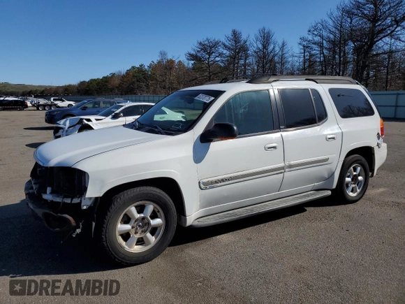 2003 GMC Envoy SLT z VIN 1GKET16S736179347, wystawiony jako Copart lot #52370775 z przebiegiem 230 623 mil mil oraz Szkoda całkowita • Salvage title. Historia ofert i sprzedaży dostępna na DreamBid. Obrazek 1.