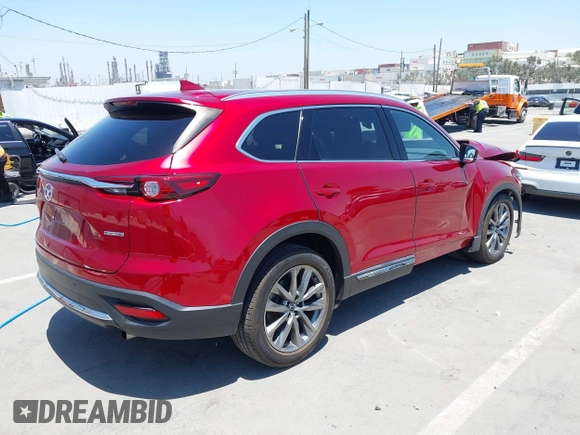 2020 Mazda CX-9 Signature with VIN JM3TCBEY7L0406190, listed as a IAAI auction lot 42397660 with 55,007 mi miles and . Bid and sale history available at DreamBid. Image 4.