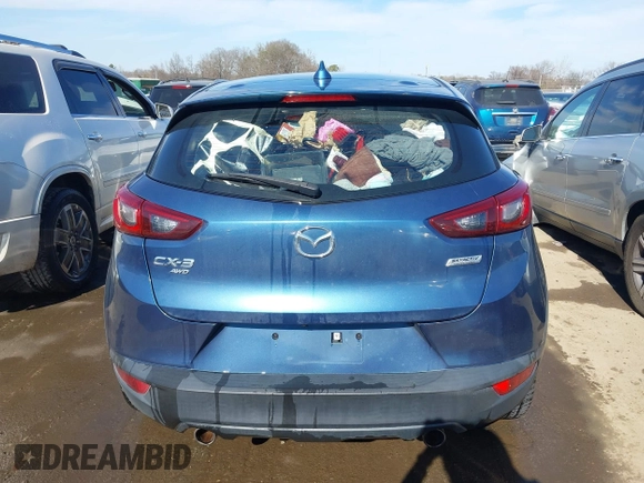 2018 Mazda CX-3 Touring z VIN JM1DKFC73J0301449, wystawiony jako IAAI lot #41678604 z przebiegiem 105 249 mil mil oraz . Historia ofert i sprzedaży dostępna na DreamBid. Obrazek 16.
