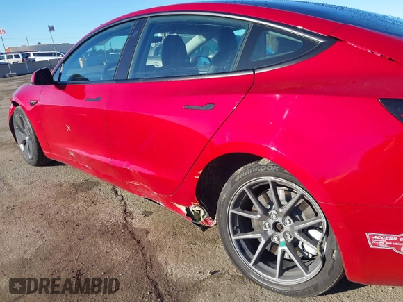 2022 Tesla Model 3 Long Range with VIN 5YJ3E1EB0NF212257, listed as a IAAI auction lot 41735989 with 28,528 mi miles and . Bid and sale history available at DreamBid. Image 6.