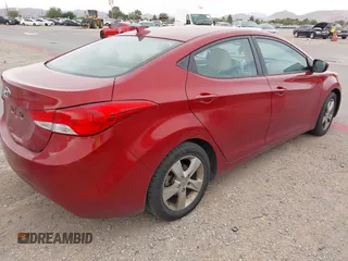 2012 Hyundai Elantra Limited with VIN KMHDH4AE4CU299884, listed as a IAAI auction lot 42032017 with 148,216 mi miles. Bid and sale history available at carsss.com. Image 4.