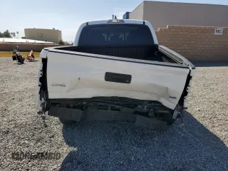 2023 Toyota Tacoma SR z VIN 3TMCZ5AN5PM594103, wystawiony jako Copart lot #52957955 z przebiegiem 21 759 mil mil oraz Szkoda całkowita • Salvage title. Historia ofert i sprzedaży dostępna na DreamBid. Obrazek 6.