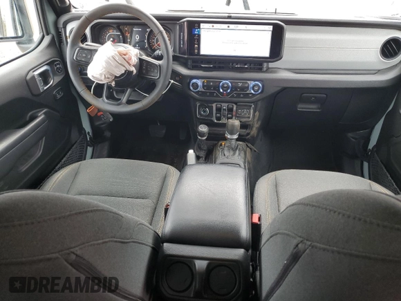 2024 Jeep Wrangler Sport S with VIN 1C4PJXDG6RW229336, listed as a Copart auction lot 51260335 with 5,198 mi miles and Salvage Title. Bid and sale history available at DreamBid. Image 8.