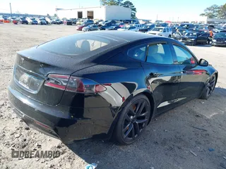 2021 Tesla Model S Long Range z VIN 5YJSA1E50MF438864, wystawiony jako IAAI lot #41190778 z przebiegiem Nie podano mil oraz . Historia ofert i sprzedaży dostępna na DreamBid. Obrazek 4.