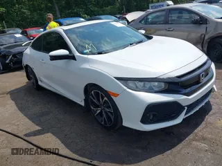 2018 Honda Civic Si z VIN 2HGFC3A54JH755941, wystawiony jako IAAI lot #42269677 z przebiegiem 99 627 mil mil oraz . Historia ofert i sprzedaży dostępna na DreamBid. Obrazek 1.
