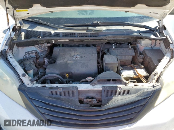 2012 Toyota Sienna with VIN 5TDZK3DC2CS244967, listed as a Copart auction lot 49787795 with 242,667 mi miles and Salvage Title. Bid and sale history available at carsss.com. Image 12.