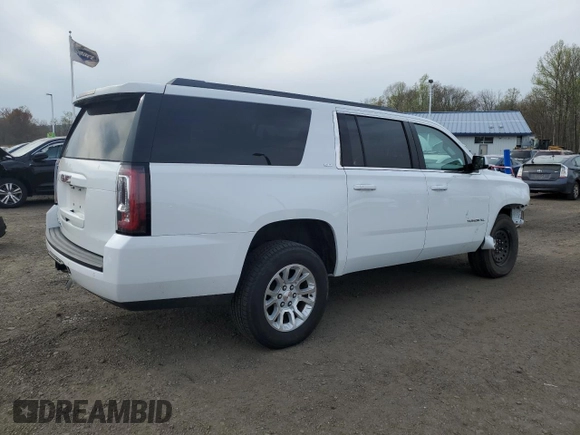 2018 GMC Yukon XL SLT with VIN 1GKS2GKC8JR307890, listed as a Copart auction lot 54428945 with 65,590 mi miles and Salvage title. Bid and sale history available at DreamBid. Image 3.