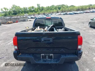 2019 Toyota Tacoma SR with VIN 5TFSX5EN7KX070319, listed as a IAAI auction lot 42475609 with 62,029 mi miles and . Bid and sale history available at DreamBid. Image 16.