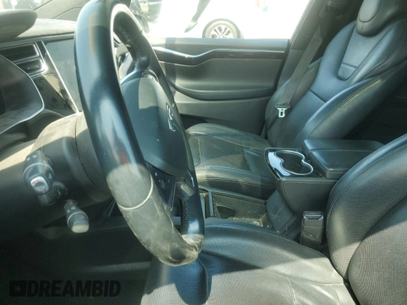 2016 Tesla Model X 70D z VIN 5YJXCBE20GF022698, wystawiony jako Copart lot #55328535 z przebiegiem Nie podano mil oraz Szkody całkowita. Historia ofert i sprzedaży dostępna na DreamBid. Obrazek 7.