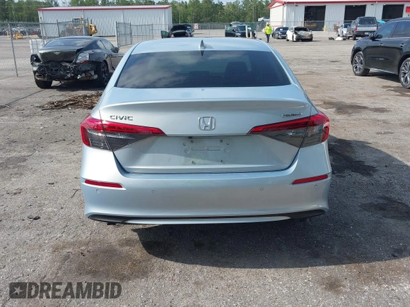 2023 Honda Civic Touring with VIN 2HGFE1F91PH305053, listed as a IAAI auction lot 42378311 with 41,576 mi miles and . Bid and sale history available at DreamBid. Image 17.