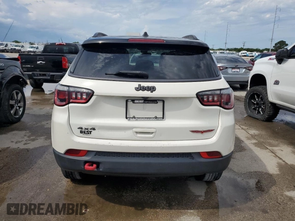 2019 Jeep Compass Trailhawk z VIN 3C4NJDDB5KT799401, wystawiony jako Copart lot #54770485 z przebiegiem 87 640 mil mil oraz Nie do naprawy • Non repairable. Historia ofert i sprzedaży dostępna na DreamBid. Obrazek 6.