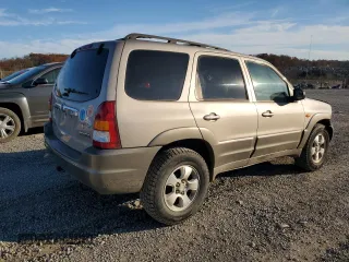 2002 Mazda Tribute LX with VIN 4F2YU09182KM36685, listed as a Copart auction lot 79732664 with 204,262 mi miles and Salvage Title. Bid and sale history available at carsss.com. Image 3.