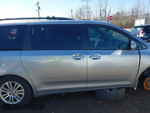 2013 Toyota Sienna XLE AAS with VIN 5TDYK3DC9DS304059, listed as a IAAI auction lot 41883196 with 170,842 mi miles and . Bid and sale history available at DreamBid. Image 14.