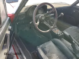 1984 Alfa Romeo Spider Veloce z VIN ZARBA5414E1020264, wystawiony jako Copart lot #75438954 z przebiegiem Nie podano mil oraz Nie do naprawy • Non repairable. Historia ofert i sprzedaży dostępna na DreamBid. Obrazek 8.