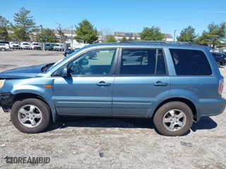 2006 Honda Pilot EX-L with RES with VIN 2HKYF18626H505792, listed as a IAAI auction lot 41861686 with 180,551 mi miles. Bid and sale history available at carsss.com. Image 14.