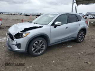 2016 Mazda CX-5 Grand Touring with VIN JM3KE2DY2G0894056, listed as a Copart auction lot 49247815 with 56,039 mi miles and Salvage Title. Bid and sale history available at carsss.com. Image 1.