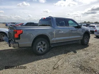 2023 Ford F-150 Lightning Pro z VIN 1FT6W1EV4PWG42053, wystawiony jako Copart lot #50003045 z przebiegiem 29 320 mil mil oraz Szkody całkowita. Historia ofert i sprzedaży dostępna na DreamBid. Obrazek 3.