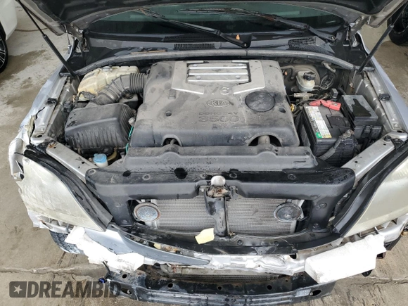 2005 Kia Sorento LX z VIN KNDJC733855449656, wystawiony jako Copart lot #52234685 z przebiegiem 114 398 mil mil oraz Szkoda całkowita • Salvage title. Historia ofert i sprzedaży dostępna na DreamBid. Obrazek 12.