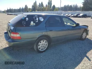 1997 Honda Accord LX with VIN 1HGCE1827VA005872, listed as a Copart auction lot 73034134 with 189,066 mi miles and Salvage Title. Bid and sale history available at carsss.com. Image 3.