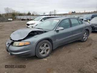 2004 Pontiac Bonneville SLE z VIN 1G2HY52K24U164098, wystawiony jako Copart lot #82283344 z przebiegiem 132 456 mil mil oraz Szkoda całkowita • Salvage title. Historia ofert i sprzedaży dostępna na DreamBid. Obrazek 1.