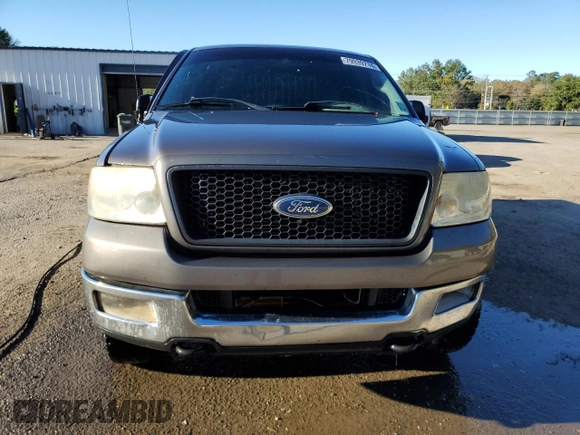 2004 Ford F-150 XLT with VIN 1FTRW14W54KB87028, listed as a Copart auction lot 79939714 with 260,492 mi miles and Salvage Title. Bid and sale history available at carsss.com. Image 5.
