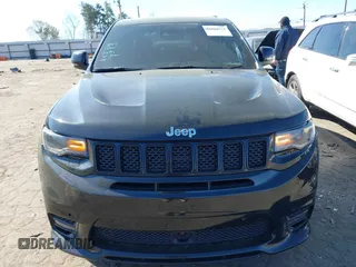 2017 Jeep Grand Cherokee SRT with VIN 1C4RJFDJ2HC696025, listed as a IAAI auction lot 41863274 with 126,949 mi miles. Bid and sale history available at carsss.com. Image 12.