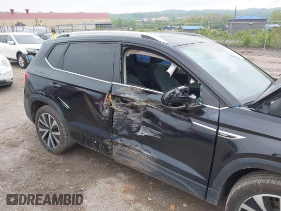 2023 Volkswagen Taos SE z VIN 3VVNX7B22PM330188, wystawiony jako IAAI lot #42219485 z przebiegiem 26 166 mil mil oraz . Historia ofert i sprzedaży dostępna na DreamBid. Obrazek 6.