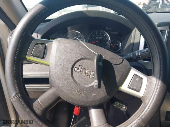2010 Jeep Grand Cherokee Laredo with VIN 1J4PS4GK6AC112447, listed as a IAAI auction lot 42086245 with 150,875 mi miles. Bid and sale history available at carsss.com. Image 11.