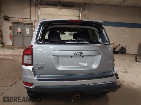2016 Jeep Compass Latitude with VIN 1C4NJDEB4GD631759, listed as a IAAI auction lot 42193660 with 100,659 mi miles and . Bid and sale history available at DreamBid. Image 16.
