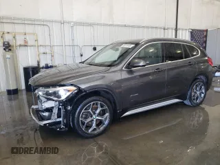 2016 BMW X1 xDrive28i z VIN WBXHT3C31GP882835, wystawiony jako Copart lot #56519105 z przebiegiem 137 136 mil mil oraz Szkoda całkowita • Salvage title. Historia ofert i sprzedaży dostępna na DreamBid. Obrazek 1.