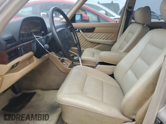 1989 Mercedes-Benz 560 with VIN WDBCA39E1KA479955, listed as a Copart auction lot 76202804 with 132,546 mi miles and Salvage Title. Bid and sale history available at DreamBid. Image 7.