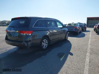 2016 Honda Odyssey EX-L with VIN 5FNRL5H6XGB020370, listed as a IAAI auction lot 41843941 with 189,980 mi miles. Bid and sale history available at carsss.com. Image 4.
