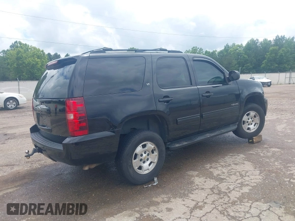 2014 Chevrolet Tahoe LT z VIN 1GNSKBE02ER133795, wystawiony jako IAAI lot #42335322 z przebiegiem 217 292 mil mil oraz . Historia ofert i sprzedaży dostępna na DreamBid. Obrazek 4.
