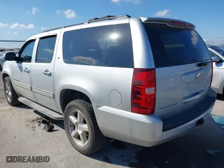 2012 Chevrolet Suburban LT with VIN 1GNSCJE01CR220186, listed as a IAAI auction lot 41476520 with 117,714 mi miles. Bid and sale history available at carsss.com. Image 3.